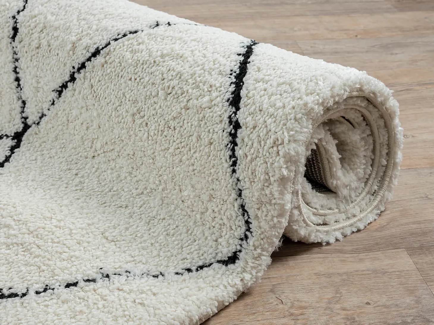 Alfombra Bahar Shaggy moderna patrón rombos, negro blanco, 120 cm redonda
