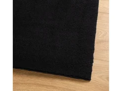 Alfombra HUARTE de pelo corto suave y lavable negra 80x150 cm