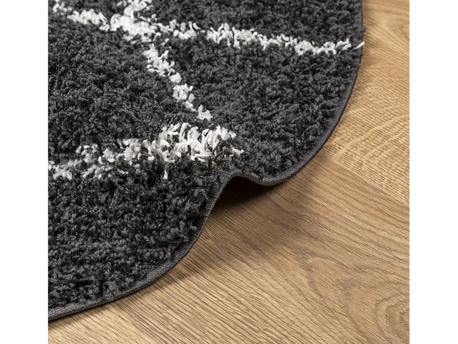 Online Alfombra moderna de pelo largo en color negro y crema, Ø 80 cm Multicolor