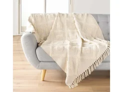 Manta tufted con borlas