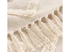 Manta tufted con borlas